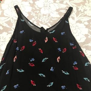 Flowered black top with open bow ties in back